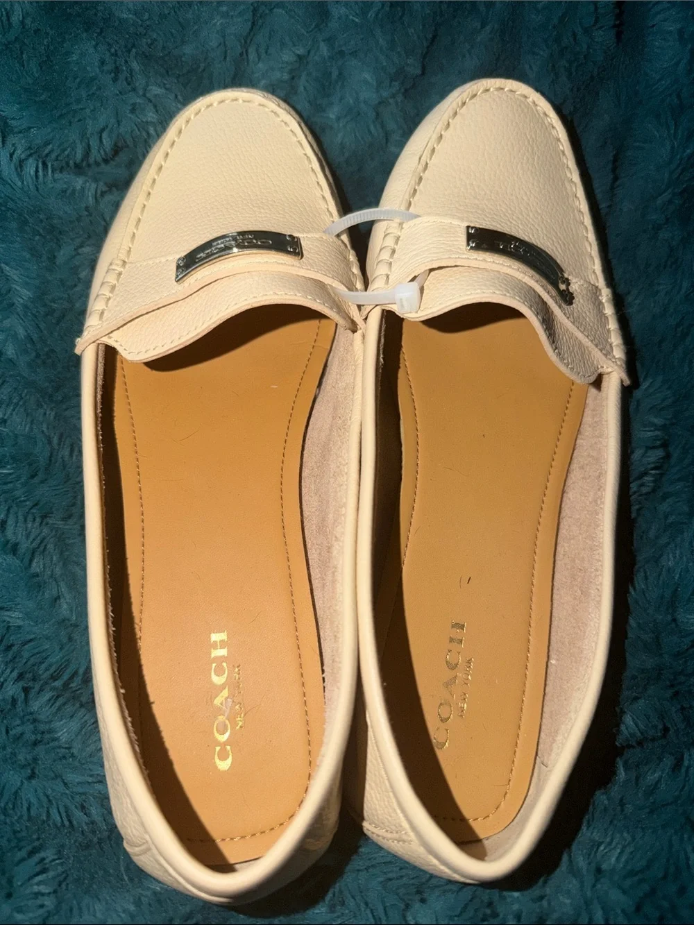 Coach Cream Leather Slip-On Loafers with Silver Metal Plaque 9.5
